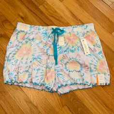 Secret Treasures Tie Dye Pajama/Lounge Shorts. Size Medium (8-10) Relaxed Fit. New With Tag! Pockets! Elastic Drawstring Waist. Ruffled Edge. Super Soft!!! Blue Sleep Bottoms For Spring, Spring Sleep Bottoms In Blue, Multicolor Cotton Pajama Shorts With Relaxed Fit, Multicolor Cotton Sleepwear With Elastic Waistband, Multicolor Summer Pajama Shorts For Bedtime, Multicolor Sleepwear With Elastic Waistband For Pajama Party, Casual Pajama Shorts For Spring Bedtime, Casual Blue Sleepwear For Vacation, Multicolor Pajama Shorts For Bedtime In Spring