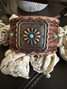 ⚠️⚠️⚠️SHIPPING ALERT⚠️⚠️⚠️ I will be away from the studio through August 2. Orders placed after July 24 will NOT ship out until Thursday, August 8 Shipping will be delayed and will resume Thursday, August 8. Please keep this in mind when placing your order. Thank you for your patience  leather bracelet cuff, western jewelry Embossed distressed new genuine 1 1/2" brown leather strap has been adorned with a distressed antiqued bronze concho. Four turquoise domed rivets accent the cuff. One antique Vintage Brown Jewelry For Rodeo, Western Leather Concho Cuff Bracelet, Brown Concho Jewelry For Rodeo, Rustic Brown Jewelry For Rodeo, Vintage Brown Jewelry For Western-themed Events, Southwestern Hand Tooled Brown Cuff Bracelet, Rustic Brown Cuff Bracelet With Concho, Hand Tooled Brown Jewelry For Rodeo, Vintage Adjustable Leather Bracelet With Concho