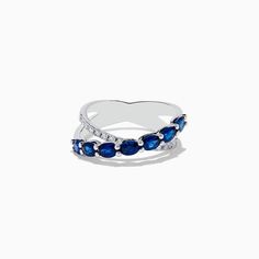 a white gold ring with blue sapphires and diamonds