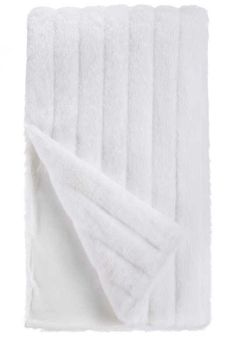 six white towels folded on top of each other