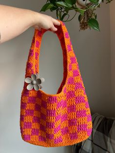 * Made with mostly 100% cotton yarn, making it perfect for summer outings!  * The perfect everyday tote bag that's easy to pair with your outfit!  *Makes a great gift for your friends or family!   *Custom made with your preferred colours. Message me a photo of what you would like and I am happy to make it for you!  * Hand-washing is preferred to maintain quality of the yarn! Handmade Cotton Crochet Bag, Handmade Cotton Beach Bag For Summer, Handmade Orange Beach Bag For Summer, Pink Cotton Summer Beach Bag, Crochet Cotton Tote Bag, Everyday Rectangular Crochet Cotton Bag, Everyday Rectangular Cotton Crochet Bag, Summer Weekend Cotton Beach Bag, Summer Orange Shoulder Bag For Everyday Use