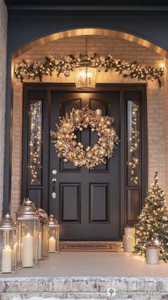 a front door decorated with christmas lights and wreath