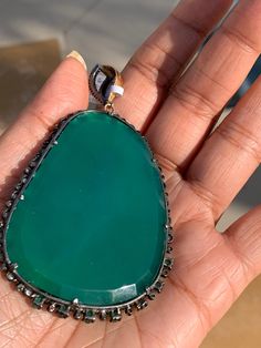 Stunning Emerald Diamond Green Onyx Pearl pendant, Beautiful Emerald pearl Pendant chic holiday wear elegant playful Gross Weight 40.10 Emerald 3.41 carats diamond .60 carats Onyx 137.55 carats Pearl 5.57 carats Lenght 3.6 inches 14k gold Silver HJ#11S600 Elegant Diamond Pendant Gemstone, Oval Diamond Jewelry With Pearl Pendant, Luxury Teardrop Pearl Pendant Jewelry, Fine Jewelry Diamond Pendant Gemstones, Diamond Drop Jewelry With Pearl Pendant, Elegant Rose Cut Diamonds For Gifts, Luxury Pendant Gemstones For Anniversary, Luxury Drop Pearl Pendant Jewelry, Luxury Wedding Pendant Gemstones