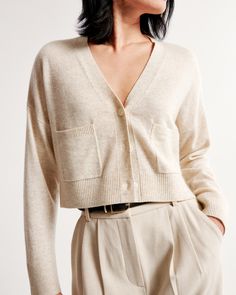 Comfy elevated cardigan in our luxuriously soft 100% cashmere fabric, featuring a button-up front and ribbed hem and cuffs. The perfect elevated staple in your wardrobe that can be layered or worn by itself buttoned up! Cream Colored Cardigan, Cashmere Fabric, Cashmere Color, Womens Cashmere, Cashmere Cardigan, Polished Look, Women's Tops, Cardigans For Women, Abercrombie Fitch