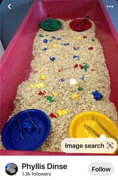 a pink plastic container filled with lots of rice