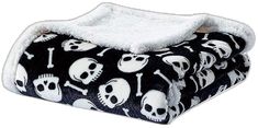 two blankets with skulls and bones on them