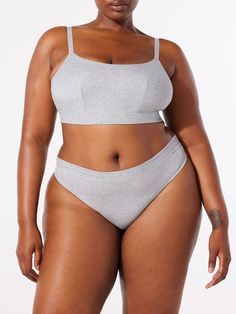 A lightweight, breathable must-have, our Cotton Essentials Thong Panty is made from a super-soft cotton jersey fabric and features a mid-rise waist. Loungewear Briefs With Elastic Waistband, Cotton Bottoms With Moderate Coverage For Everyday, Sporty Cotton Bottoms With Soft Touch, Gray Seamless Cotton Bottoms, Cotton Bottoms With Seamless Construction For Loungewear, Cotton Seamless Loungewear Bottoms, Seamless Minimal Stretch Bottoms For Loungewear, Everyday Cotton Bottoms With Soft Touch, Soft Touch Cotton Bottoms For Everyday