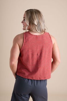 Simple, timeless, & easy. We named it the Classic Tank for a reason! Now available in fresh patterned Red Check, Wisteria, and Poppy! We updated the fit of this tank by lowering the neckline and armpit just a teeny touch. Red Relaxed Fit Sleeveless Top, Red Sleeveless Relaxed Fit Top, Red Sleeveless Top With Relaxed Fit, Red Casual Sleeveless Blouse, Casual Red Sleeveless Blouse, Casual Red Sleeveless Top, Red Cotton Vest Top, Relaxed Fit Sleeveless Crop Top, Jumpsuit And Cardigan