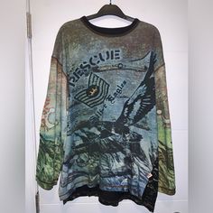 Size Men’s Large Gently Pre Owned; Excellent Condition 100% Cotton Measurement’s Armpit To Armpit: 48 Inches Length: 30 Inches Z5 Alternative Crew Neck Tops For Fall, Alternative Style Crew Neck Tops For Fall, Grunge Long Sleeve Tops With Graffiti Print, Winter Grunge Graphic Print Tops, Casual Long Sleeve Shirt With Graffiti Print, Alternative Crew Neck Streetwear Tops, Alternative Crew Neck Tops For Streetwear, Alternative Graphic Print Crew Neck Top, Alternative Style Graphic Print Crew Neck Top