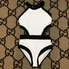 Women’s Black & White Monokini Bathing Suits Size L Brand New No Tags Never Worn Bust 30in Unstretched Can Stretch 32in-34in Bottom Waist 28in Stretch To 30-33in Can Fit A Petite Large. Runs Small Halter Top 1pc With Side Cutouts. No Tags / No Protective Stickers (As It Stains Suit In Storage) Never Exposed To Smoking/Alcohol/Pet See My Other Listings To See I Handle My Clothes With Utmost Care, Hardly Worn Probably Once Fitted Halter Neck Swimwear With Cutout, Fitted Halter Neck Cutout Swimwear, White Fitted Halter Neck Swimwear, Cutout Swimwear For Night Out In Summer, Summer Cutout Swimwear For Night Out, White Fitted One-piece Swimwear, Fitted Cutout Swimwear For Night Out, Fitted One-piece Swimwear With Cutout, Fitted One-piece Cutout Swimwear