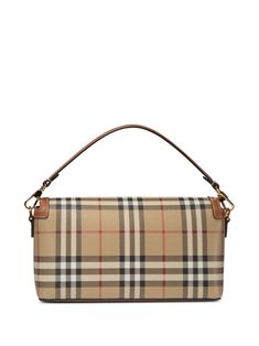 Find BURBERRY Vintage Check Logo-plaque Shoulder Bag on Editorialist. This Burberry shoulder bag is crafted from calf leather in the iconic Vintage Check pattern. The bag features a gold-tone logo plaque, a foldover top with a magnetic fastening, and an adjustable detachable shoulder strap. It also has a single top handle and an internal logo patch.