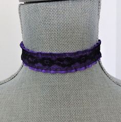 Purple choker necklace is made up in a ruffled purple satin ribbon with a black lace overlay. The ribbon is crimped on the ends with antique brass metal crimp bars and the choker measures 13" on the first link closure and with an extension chain allows for adjustable fit to 15". The extension chain has a wire wrapped black glass bead dangle on the end of the chain.  There is a antique brass hook closure on the choker. If you need another size just send me a message with your order and I can adjust the length for you. All of my jewelry items come boxed, and ribbon tied and tagged for easy gifting. Purple Choker Necklace, West Girl, Purple Choker, Ribbon Choker Necklace, Ribbon Choker, Lace Choker, Antique Brass Metal, Ribbon Necklace, Brass Hook