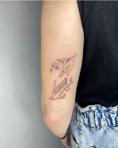 a person with a tattoo on their arm