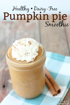 healthy dairy - free pumpkin pie smoothie in a mason jar with whipped cream on top