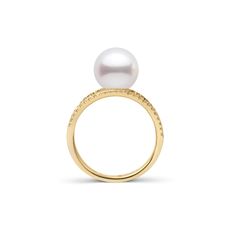 The arches of this ring bridge the 9.0-10.0 mm Freshadama pearl for a charming statement. With delicate curves of solid gold, the pearl appears to balance between the two diamond bands while being held securely in place. Freshadama pearls are sorted highest .01% of the freshwater pearl harvest each year. These pearls are exceptionally difficult to collect, and we've been proudly offering them for decades through our exclusive partnerships in Asia. With less than 5% deviation from a perfectly rou Timeless Yellow Gold Open Pearl Ring, Fine Jewelry Akoya Pearl Rings With Brilliant Cut, Timeless Akoya Pearl Drop Ring, Oval Yellow Gold Pearl Ring, Oval Pearl Ring In Yellow Gold, Formal Yellow Gold Akoya Pearl Ring, Formal Yellow Gold Pearl Rings, Timeless Akoya Pearl Round Rings, Timeless Yellow Gold Akoya Pearl Ring