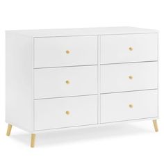 an image of a white dresser with gold knobs on the top and bottom drawers