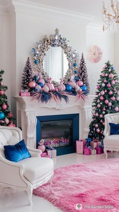 a living room decorated for christmas with pink and blue decorations