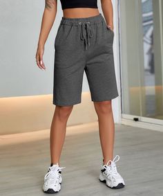 The EMES SHOP shorts are detailed with a classic solid color. Features a drawstring waist. side pockets. regular fit. and above knee length. Pair it with a cropped tank top and sneakers for an easygoing summer look.MATERIAL:100% Soft Poly MEASUREMENTS: Trousers Length is 20"-22"in Small | Waist: 25-37"in & Hip : 35-37"in Medium |Waist: 26-39"in & Hip : 37-39"in Large |Waist: 29-41"in & Hip : 39-41"in X Large |Waist: 31-44"in & Hip : 42-44"in MEASUREMENTS:Trousers Length is 53-56 cm Small |Waist: 64-96 cm & Hip : 91-96 cm Medium | Waist: 68-100 cm & Hip : 95-100 cm Large | Waist: 74-106 cm & Hip : 101-106 cm X Large | Waist: 80-112 cm & Hip : 107-112 cm Eatonton Georgia, Summer Look, Small Waist, Above Knee, Cropped Tank Top, Crop Tank, Dark Black, Summer Looks, Drawstring Waist