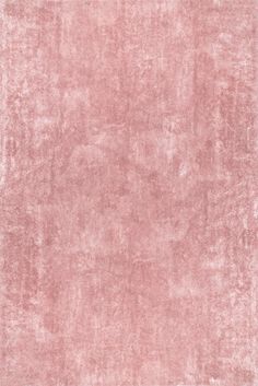 a pink rug is shown in the middle of an area that looks like it has been dyed