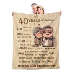 an anniversary gift blanket with a couple hugging each other and the words 40 years of marriage printed on it