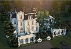 an artist's rendering of a large mansion in the middle of a wooded area