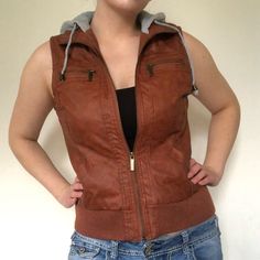 Brown Vegan Leather Vest Spice Brown Faux Leather Vest By Deb. From The Early 2010’s In The Height Of The Indie Sleaze Era. Bronze Hardware And Heather Gray Stretch Cotton Blend Hood. Chest And Waist Pockets. Great For Fall Weather. Never Worn, Like New Condition But Tags Have Been Removed. Tagged Size Small. True To Size. Measurements Shoulder: 13.5” Bust: 36” Waist: 32” Length: 21” #Shore #Jersey #Trashy #Sleaze #Y2k Brown Hooded Outerwear For Everyday, Casual Faux Leather Jacket With Faux Pockets, Casual Brown Leather Jacket For Spring, Casual Brown Faux Leather Outerwear, Casual Brown Outerwear With Faux Front Pockets, Everyday Brown Leather Jacket For Fall, Everyday Fitted Brown Outerwear, Brown Fitted Outerwear For Everyday, Everyday Brown Fitted Outerwear