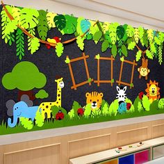 a wall mural in a children's room with animals and trees