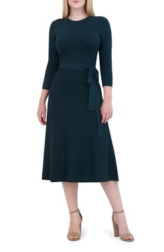 Simple and elegant, this evening-out A-line dress is designed with a defining satiny sash. Slips on over head Jewel neck Three-quarter sleeves Tie belt Unlined 65% rayon, 35% nylon Machine wash, dry flat Imported A-line Belted Dress For Evening, Elegant Belted Dress With Tie Waist For Party, Elegant Belted Midi Dress With 3/4 Sleeves, Elegant Formal Belted Dress With Tie Waist, Belted A-line Evening Dresses, A-line Belted Dress For Party, Fitted Evening Belted Dress With Tie Waist, Evening Fitted Belted Dress With Tie Waist, Formal Fitted A-line Belted Dress