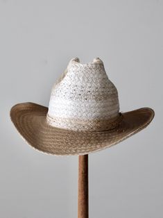 "This is a vintage white straw cowboy hat. The classic woven hat shows fantastic wear with a darkening to the tone of the brim. Rockmount Kushion-Komfort interior hat band. CONDITION In good condition with wear consistent with age and use. General wear and aged tone. Tiny spot of end fray on the side brim. MARKED SIZE: 7 MEASUREMENTS Interior Circumference: 21.75\" .. 55.2 cm Height: 5.25\" .. 13.3 cm Brim: 3.25\" .. 8.3 cm 72037" Hippie Boots, Woven Hat, Straw Cowboy Hat, Hat Band, Cowboy Hat, Vintage 70s, White Vintage, Cowboy Boots, Cowboy Hats