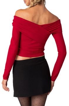 Elevate your night-out style with this bright and bold crop top featuring a shoulder-baring neckline. Off-the-shoulder neck Long sleeves 95% polyester, 5% spandex Machine wash, dry flat Imported Evening Cropped Stretch Top, Evening Stretch Cropped Tops, Cropped Tops For Evening Wear In Fall, Red Off-shoulder Tops For Fall, Red Off-shoulder Top For Night Out, Red Fitted Off-shoulder Top, Fall Off-shoulder Red Tops, Fall Season Red Off-shoulder Tops, Cropped One Shoulder Top For Party