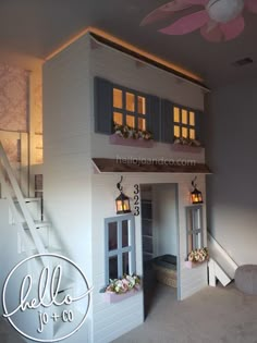 a doll house is shown with the stairs leading up to it's second floor