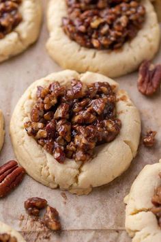 pecan cookies are arranged on a baking sheet