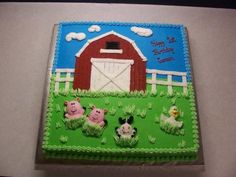 a birthday cake with farm animals on it