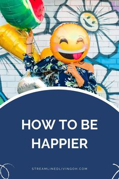 a person holding balloons with the words how to be happy on it and an image of a