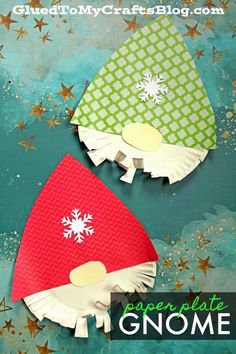 two paper plate gnomes with snowflakes on them and the words gnome craft