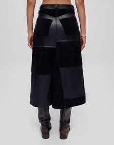 The Mid Rise Leather Patchwork Skirt in Black is inspired by the casual utility silhouettes of the early 2000s. Constructed from lightweight lamb leather and suede, each skirt features a slouchy mid rise, midi length, classic 5-pocket details, patchwork constructed, and double needle stitching. Black Cargo Skirt For Work, Leather Pencil Skirt For Work, Leather Utility Bottoms For Workwear, Chic Workwear Skirt With Patch Pockets, Fall Workwear Cargo Skirt With Belt Loops, Relaxed Knee-length Leather Skirt, Modern Leather Pencil Skirt, Modern Leather Skirt For Work, Leather Skirt With Belt Loops For Fall