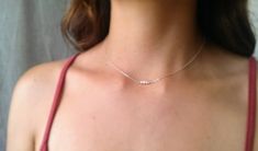 "\"Safra\" ♀️ 925 sterling silver dainty chain necklace with three tiny pearls ♀️ Pearl: Purity,innocence, generosity ♀️ Birthstone month: June ♀️ Length: 16 in. and 18 in. (Model is wearing 16 in. necklace) ♀️ Nickel free ♀️ Made in the USA Safra Catz is the highest paid woman CEO with a $40 million salary." Delicate Sterling Silver Pearl Necklace With Delicate Chain, Delicate Silver Necklace With Tiny Beads, Delicate Sterling Silver Necklace With Tiny Beads, Tiny Pearl Necklace, Women Ceo, Simple Pearl Necklace, Dainty Pearl Necklace, Dainty Chain Necklace, Simple Necklace