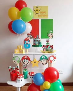 mario birthday party with balloons and decorations