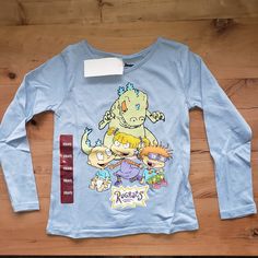 New With Tags Xs(4/5) S(6/6x) M(7/8) L(10/12) Blue Cartoon Print Long Sleeve Shirt, Blue Long Sleeve Shirt With Cartoon Print, Fun Blue Long Sleeve T-shirt, Blue Long Sleeve Top With Character Print, Fitted Long Sleeve Top With Cartoon Print, Playful Long Sleeve Blue T-shirt, Ninja Turtle Shirt, Graphic Long Sleeve Shirts, Turtle Shirts