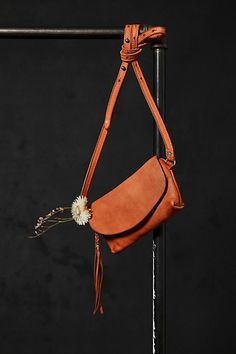 So simple and essential, this go-with-everything leather crossbody bag is the perfect compact place to keep your necessities. **Features:** Crossbody style, compact design, leather fabrication, flap and zipper closure, adjustable shoulder strap, tassel detail **Why We | We The Free Rider Crossbody Bag at Free People in Orange Boho Leather Bags, Boho Leather, Coral Gables, Leather Work, Simple Bags, Magpie, Blouse Vintage, Fashion Essentials, Boho Clothing