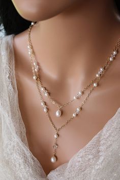 This is also available in Rose Gold! A very popular style because it goes with almost any gown!  It is perfect with a sweetheart or plunging neckline.  It has round Swarovski crystals and pearls that have been hand wire wrapped to link into the gold fill chain.  Swarovski tear drop pearls dangle as the front drops and are available in white or cream.  The necklace is finished with a simple gold fill clasp.  The necklace measures 21 1/2 inches around the neck plus a 1 1/2 inch drop. This necklace can also be made with a single strand in front and the length of the necklace can be adjusted to your liking.  All of my jewelry can be customized. Please note that I use actual gold fill chain NOT gold color or plated.   Check out the Matching Earrings: https://www.etsy.com/listing/223768906/pearl Boho Bridal Necklace, Wedding Dress Add Ons, Bridal Backdrop, Baroque Necklace, Bridal Backdrop Necklace, قلادات متدلية, Rose Gold Chain Necklace, Backdrop Necklace, Necklace With Pearls