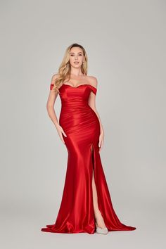 Make a statement at any event with the daring Ruby Red Off-Shoulder Satin Evening Dress by Jessica Stuart. Bardot neckline Rouching details compliment your figure Stretch satin fabric and zip-up back High Leg split adds an extra touch of elegance, perfect for black tie balls or galas. Satin Evening Dress, Stretch Satin Fabric, Bardot Neckline, Prom Shopping, Satin Evening Dresses, Leg Split, Red Dress Women, Stretch Satin, High Leg