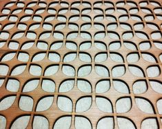 a wooden table topped with lots of white circles