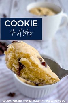 a close up of a spoon with a cookie on it