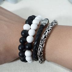 This distance bracelet set makes a great gift for couples, friends, and family. Each complete bracelet has one bead switched with the other, to represent having the other person with you no matter the distance. The high contrast of black and white onyx will bring you a quick reminder of the special people in your life with a glance. Bracelet can be made in different sizes if requested, if no request is made the white bracelet will come in 6.75-7 inch in diameter, and the black will come in appro Distance Bracelet, Distance Bracelets, Couples Friends, White Bracelet, White Onyx, White Bracelets, Gift For Couples, High Contrast, Special People