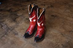 Vintage circa 1990's Rocket Buster Boots women's cowboy boots, red leather with fancy black leather details, white cow skulls and stars. The boots fit like a women's US size 6 1/2 an approximate Europe size 37, see the measurements for the best fit for you. LABELS: Rocketbuster Boots El Paso TX, USA Condition: The boots are well made with good soles and heel with exterior wear that was taken into consideration when pricing, see photos.  MEASUREMENTS (inches) : Length 9 3/4" interior 10" exterior measured straight across Width 3" interior 3 3/4" exterior Heel 1 1/2" Height 10 1/2" not including the heel Calf circumference 12 1/2" SEE THE REST OF MY SHOP: www.etsy.com/shop/southwestvintage *International shipment with be sent Priority mail International with insurance which accounts for the Rocketbuster Boots, Cow Skulls, Women's Cowboy Boots, Steer Head, Boots Fit, Leather Western Boots, White Cow, Trending Boots, Cowboy Boots Women