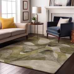 a living room with two couches and a rug on the floor in front of a fireplace