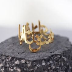 Our jewelry is always long lasting, beautiful, and of the highest quality. Our Persian (Farsi) and Arabic items are classic, unique pieces that are worth the investment. Personalize your ring with this beautiful writing. We are happy to translate for you and we can't wait for you to fall in love with your very own piece.DETAILS- Crafted with pure sterling silver and optional gold-plating OR pure solid gold- Due to different finger sizes, each ring may vary slightly from photos.- Made in New York Elegant Yellow Gold Jewelry With Engraved Text, Unique Gold Engraved Promise Ring, Gold Nameplate Ring For Gift, Round Custom Name Jewelry For Promise, Custom Name Round Jewelry For Promise, Promise Nameplate Jewelry, Promise Nameplate Jewelry With Name, 14k Gold Jewelry With Engraved Text, Custom Name White Gold Jewelry For Promise