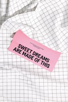 a pink sticker that says sweet dreams are made of this on a white shirt