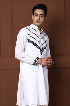 White kurta with thread embroidered floral jaal and geometric patterns. Comes with a pathani. - Aza Fashions Kurta With Motifs For Traditional Ceremonies At Eid, Cotton Sherwani With Chikankari Embroidery In Traditional Fit, Cotton Sherwani With Traditional Fit For Ceremonies, Eid Kurta With Motifs For Traditional Ceremonies, Traditional White Kurta With Dabka, Traditional Fit Cotton Sherwani With Cutdana, Cotton Sherwani With Cutdana In Traditional Fit, Cotton Sherwani With Cutdana For Traditional Ceremonies, Transitional Season Cotton Sherwani With Traditional Fit